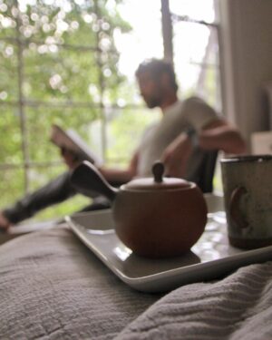 Daniel Gillies Instagram - my amazing girlfriend @msjuliamisaki recently launched the remarkable HIKARI TEA available domestically in the United States. 

go to hikaritea.com or hit the link in my bio.

100% organic loose leaf japanese tea and i’m not certain it doesn’t have actual magical properties.

quite honestly, I consider it one of the essential elements of my day now. zero ‘speediness’ that I often find with coffee; only mental clarity and calm. 

the quality of the flavor is so beautiful: the subtlety of texture and the rich fullness of the leaf.

go to her site and order some or I’ll hunt you down. 🇯🇵❤️🫖

meanwhile here are some pics of Julia and I wandering through Japanese gardens, me reading a book and staring pensively into the distance (not at all staged and YES you can buy that adorable teapot from the site) and Julia looking 🔥 in Paris (also drinking tea). 

❤️❤️❤️