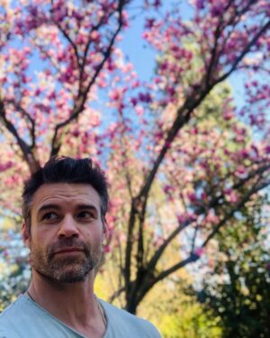 Daniel Gillies Instagram - my amazing girlfriend @msjuliamisaki recently launched the remarkable HIKARI TEA available domestically in the United States. 

go to hikaritea.com or hit the link in my bio.

100% organic loose leaf japanese tea and i’m not certain it doesn’t have actual magical properties.

quite honestly, I consider it one of the essential elements of my day now. zero ‘speediness’ that I often find with coffee; only mental clarity and calm. 

the quality of the flavor is so beautiful: the subtlety of texture and the rich fullness of the leaf.

go to her site and order some or I’ll hunt you down. 🇯🇵❤️🫖

meanwhile here are some pics of Julia and I wandering through Japanese gardens, me reading a book and staring pensively into the distance (not at all staged and YES you can buy that adorable teapot from the site) and Julia looking 🔥 in Paris (also drinking tea). 

❤️❤️❤️
