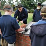Daniel Ricciardo Instagram - Spent time with some legends in the Hands On Learning program last week. I tried to help them build a pizza oven. Pretty sure I gave them more work to do 🤷🏻‍♂️ @savechildrenaus