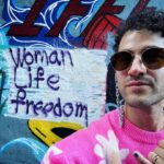 Darren Criss Instagram - Baraye - For Women Life Freedom OUT NOW. proud to have been just 1 of 16,000 voices on this song, the release of which marks the one-year anniversary of the peaceful protests against violence against women in Iran. huge thank you to the incredible @taylorhanson for putting this together and for including me. #forwomenlifefreedom #fwlf #womenlifefreedom #baraye #singforthesilenced