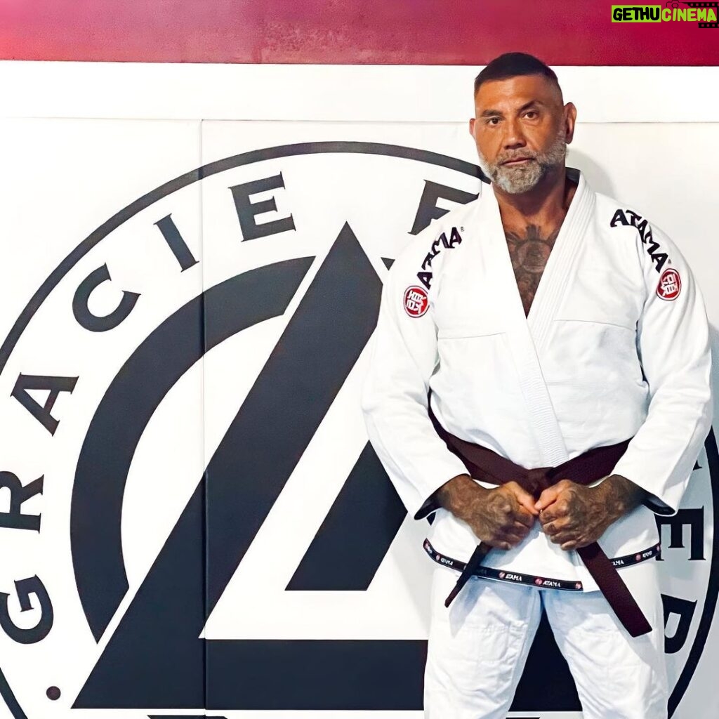 Dave Bautista Instagram - Very proud to be posting this. I started training BJJ with @cesargraciebjj @graciefighterph in 2010 and even though I got my ass handed to me by everyone at the academy, I immediately fell in love. It’s a puzzle I’ll never solve and if you know me, you know I get obsessed with things I can’t figure out. It’s been a challenging process with my work schedule, in fact I barely trained from 2014 when I got my purple belt to 2021. Last fall I dedicated myself to progressing and this week it finally happened. I was presented my brown belt by my brothers and teammates Black Belt @matheusandre1 and Black Belt @joshraff_ with the blessing of Cesar and teammate Black Belt @jasonmanly . Jason you’re a warrior and a gentleman and I’m grateful AF to know you and call you a friend. Thank you for traveling across the globe and giving up time with your babies to train my old ass. ❤️🙏🏼.. Josh and Matheus you guys have been there for me since DAY ONE , you’ve seen me at my highest and my lowest and never left my side. You can’t put a price on that type of loyalty and I’m proud to call you family. I love the shit out of you guys! ❤️ I gotta thank my homies Brown belt and World Champ @the305mvp and Brown Belt @andrew.wags for traveling in to keep me honest and help me get those reps in. Love and appreciate you both. Last but definitely not least I want to thank Black Belt and owner of Gracie Tampa South @mattarroyomma for going out of his way to get me on the mat and always making time for me. Love and respect you brother, you’re the real deal. Good days and bad days, there’s only truth on the mat. You’re exposed one way or another. If you know what I mean then you know what I fucking mean. Respect to everyone willing to put it all out there. Let’s finish what we started. Ossss.. 👊🏽 Tampa Florida
