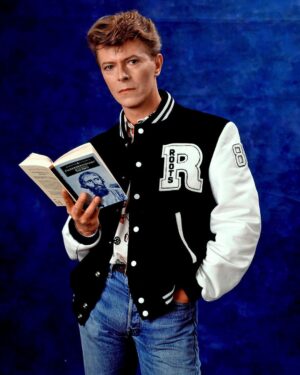David Bowie Instagram - BOWIE’S AMERICAN LIBRARIES READ CAMPAIGN AND THE IDIOT

“Calling Sister Midnight, Well, I'm an idiot for you…” 

Back in 2013 we posted BOWIE’S TOP 100 BOOKS - THE COMPLETE LIST: https://www.davidbowie.com/blog/2013/10/1/bowies-top-100-books-the-complete-list (Linktree in bio)

In 1986 photographer Chalkie Davies produced the portraits here of Bowie with Fyodor Dostoevsky’s The Idiot*, a book not on the list, but that’s no reason not to view these images again.

They were made for the American Library Association‘s READ campaign, and specifically for the 1987 David Bowie for America’s Libraries READ poster, and associated items such as bookmarks. 

* David suggested the title for the Iggy Pop album of the same name. He also took the cover shot of Iggy based on Erich Heckel’s painting Roquairol. The photograph is often miscredited to Andrew Kent. Perhaps Iggy can remember the moment?

@iggypopofficial 
@chalkiedavies 

#BowieBookClub #BowieBookLover #FyodorDostoevskyTheIdiot #IggyPopTheIdiot