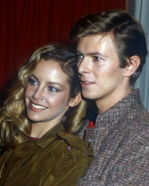 David Bowie Instagram - JUST A GIGOLO LONDON PREMIERE 45 YEARS AGO TODAY

“Came to London town...” 

The London premiere of Just a Gigolo took place on Valentine’s Day 1979. 

The first image here is of Bowie with Just A Gigolo co-star Sydne Rome at a photo call at Café Royal in Regent Street. 

The film’s premiere took place at the Prince Charles Cinema in Leicester Square where David is pictured with Viv Lynn.

The premiere invitation stated that twenties-style dress or black tie was compulsory. 

Bowie wore a dark blue kimono with baggy grey trousers and Japanese style footwear, while his date wore Willie Brown.

#BowieJustAGigolo #JustAGigolo #Bowie1979