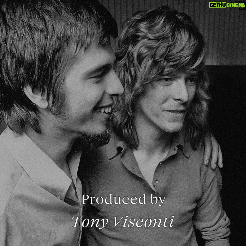 David Bowie Instagram - PRODUCED BY TONY VISCONTI CD BOX DUE OCTOBER “They can’t get enough of it all, Listen…” A 77-track 4-CD box set called Produced By Tony Visconti is released on 20th October and is available to pre-order here now, including a strictly limited edition signed version: http://tonyvisconti.lnk.to/ProducedBy (Linktree in bio) The set is a career-spanning look at the many artists Tony worked with across a period of more than fifty years. It’s been said that Tony Visconti ‘probably produced one of your all-time favourite albums’. Now for the first time, Edsel is proud to present the first definitive retrospectives of the legendary Brooklyn-born record producer. Naturally, one would expect David Bowie to be represented, and he is with the following 4 songs (one on each disc)... Young Americans (2016 Remaster) The Man Who Sold The World (2020 Mix) I Would Be Your Slave Memory of a Free Festival (2019 Mix) Of the set, Tony says, “This boxset covers five and a half decades of my efforts in the art of making iconic recordings. Some of it is familiar and some will have a eureka moment, ‘I didn’t know Visconti produced that one!’” Grammy-winning creatives @barnbrookstudio have designed the artwork, the first two images we have posted are not their work, the third is. The second image of David in the studio was taken by Tony and is accompanied with a short excerpt of the text regarding I Would Be Your Slave. The 4CD set is housed in a deluxe 80-page casebound book, with previously unseen photographs, an introduction by Tony, extensive track-by-track liner notes by author and journalist Mark Paytress (including track-by-track commentaries by Tony), and tributes from a selection of featured artists. The audio for the sets has been mastered by Phil Kinrade at AIR Mastering and personally approved by Tony. Produced By Tony Visconti is available in the following formats, though only the CD set contains Bowie tracks. PRODUCED BY TONY VISCONTI (http://tonyvisconti.lnk.to/ProducedBy) (Linktree in bio) DELUXE 4-CD 77-TRACK 7” BOXSET WITH 80 PAGE BOOK STRICTLY LIMTED EDITION DELUXE 6-LP 60-TRACK BOXSET 60 PAGE BOOK 2-LP 14-TRACK WITH 12 PAGE BOOK #BowieVisconti