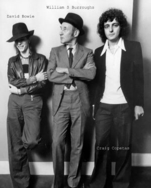David Bowie Instagram - BOWIE AND BURROUGHS IN ROLLING STONE 50 YEARS AGO TODAY

“If you want it, boys, Get it here thing…”

Fifty years ago today on 28th February 1974, Rolling Stone published a double interview with William Burroughs and David Bowie overseen by Craig Copetas.

Titled Beat Godfather Meets Glitter MainMan the interview took place on 17th November 1973 in Bowie’s London home, with pictures taken by Terry O’Neill.

It’s a fascinating read, and a great snapshot of the time, You can read the full thing here over on the brilliant Bowie resource, Bowie Golden Years: https://www.bowiegoldenyears.com/press/74-02-28-rolling-stone.html (Linktree in bio)

Before you go though, it may be worth bearing this snippet in mind from the interview...

+ - + - + - + - + - + - + - + - + - + - + - + - +

Bowie: I change my mind a lot. I usually don't agree with what I say very much. I'm an awful liar.

Burroughs: I am too.

Bowie: I'm not sure whether it's me changing my mind, or whether I lie a lot. It's somewhere between the two. I don't exactly lie, I change my mind all the time. People are always throwing things at me that I've said and I say that I didn't mean anything. You can't stand still on one point your entire life.

+ - + - + - + - + - + - + - + - + - + - + - + - +

Aside from Terry’s images, the colour shot is of the hand-coloured Wild Boys badge Bowie made. He is pictured wearing it at Studio 54. The final image is Jimmy King’s portrait of Bowie sat beneath one of Terry’s portraits in 2013.

#BowieBurroughs #BowieRollingStone #BowieONeill
