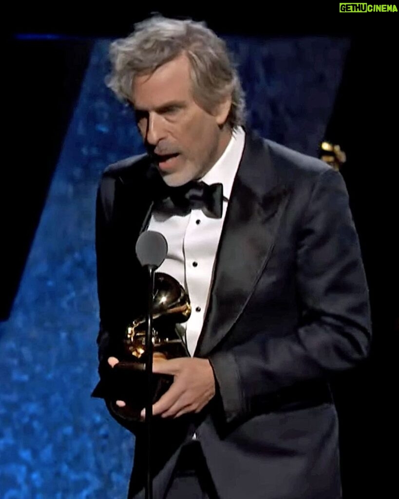 David Bowie Instagram - BRETT MORGEN ACCEPTS GRAMMY FOR BEST MUSIC FILM “Freak out in a Moonage Daydream...” Brett Morgen’s David Bowie documentary Moonage Daydream has won this year’s Grammy Award for Best Music Film, and Brett Morgen was there to accept it in person. “When I first started this project, I met with David Bowie’s executors,” Brett said during his speech. “Bill [Zysblat] said to me, 'David is not here to authorize this film, so it cannot be Bowie on Bowie. You have to embrace it. It’s going to be Morgen on Bowie.' And there are not a lot of people in this day and age who would hand over all of these archives and let me make an art project.” After thanking the executives as well as his wife and kids, Brett closed by thanking “David Bowie, the single greatest artist who’s walked the face of this earth.” Watch his acceptance speech here: https://youtu.be/gaWY2z_u44k?si=Hp_893nqQh68pLL3 (Linktree in bio) Moonage Daydream was up against stiff competition in the shape of the other nominees in the Best Music Film category, including How I'm Feeling Now (Lewis Capaldi), Live From Paris, The Big Steppers Tour (Kendrick Lamar), I Am Everything (Little Richard), and Dear Mama (Tupac Shakur). Congratulations to everyone involved in this remarkable work...particularly David Bowie! 📸 Mick Rock 📸 Masayoshi Sukita #66thGrammyAwards #Grammys2024 #BowieGrammyAwards #MoonageDaydreamFilm