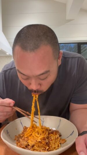 David Chang Instagram - Super simple, very tasty dish of momofuku soy & scallion noodles with our chili crunch crossed with a loose interpretation of a carbonara. Not sure what it is exactly…but it’s delicious.