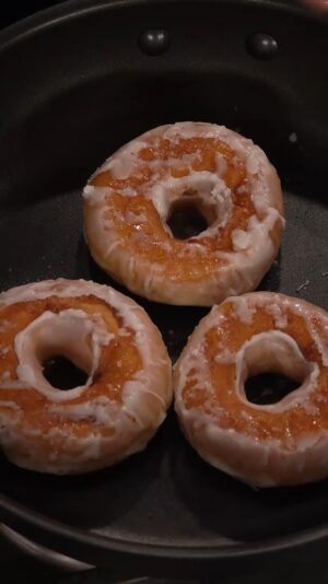 David Chang Instagram - This is the greatest dessert in the world…pan fried @krispykreme doughnut over melted ice cream and topped with more @milkbarstore ice cream. #DinnerTimeLive on @Netflix streaming now and new LIVE episodes on Tuesdays
