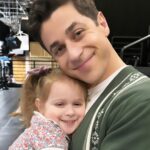David Henrie Instagram - Last night was very special for me, my baby girl got to see me act for the first time! I finished a scene, she yelled from the audience “Poppa that was funny!”, everyone laughed, then she jumped in my arms and we snapped this pic. The Russo’s have a new fan 🥰🥰🥰 . . . . . #DadLife #Dad #Russos #Wizards #WOWP #ProudDad #OnSet