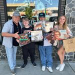 Dean Norris Instagram - Teaching the young’uns about vinyl. @armadillomusic #recordstoreday2022