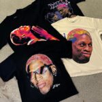 Dennis Rodman Instagram – Our highly anticipated collection of new OFFICIAL Dennis Rodman merch OUT NOW!!! 🏀🏆

– Limited Quantities
– 7.5 OZ Heavyweight Tee
– Full Color Screen-Printed Graphic
– Boxy Fit
– Thick Collar
– Vintage aesthetic
– Ships within 48 hours of ordering