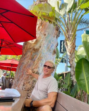 Dolph Lundgren Instagram - Enjoying lunch in Laguna Beach in the shade of this amazing 170 year old Eucalyptus tree. The tree was planted around the time California became a part of the United States. Pretty cool👍🏻👍🏻