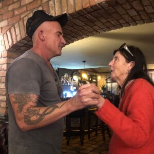 Dominic Purcell Instagram - Mum and me. Our last dance in the homeland #ireland🍀. 

Mum would have been 79 today. Not sure she’d be to stoked about that. Bit of a vain thing she was. 😂. 

It’s a terrible thing she passed so early. I think about her a lot of course and all the great stuff that’s happened in my life of late that she has missed. She’d be bragging on me to anyone that would listen whether they liked it or not about my marriage to my beautiful wife @tishcyruspurcell - they both would have adored one another. A cheeky whisper in my ear as was her wit. “punching above your weight Dominic”. I know mum, love u miss u heaps.❤️