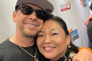 Donnie Wahlberg Instagram - I’m not sure if she knew.  I’m not sure if any of you ever truly know.  How much you mean.  How much joy you bring.  How much you inspire.  It’s often said that the smallest gesture from me, or one of my bands mates, means so much.  I hope you all know, and I pray that Jenny knew, that it works in reverse too!  The smallest little gesture, from you.  The tiniest little smile.  The thoughtful little gifts.  The funniest little joke.  The love that you so consistently share with us — means so much, too!  It may not seem like it can lift us — but it does!  One kind word can be the fuel that inspires.  It can spread through me, or my band, and touch the hearts of an arena filled with people.  A smile from the front row, can reflect off of me and touch somebody in the very last row.  They can then reflect it to everyone in their lives!  It is all so magical and it all means so much.  Jenny, if you didn’t know, you lifted our spirits so often — especially this summer!  You came all the way from down under to spread love and that love most definitely spread!  God is getting one very special angel up there.  I trust that one day, I will see you again and remind you that you were some kind of an angel down here, too.  Keep shining that light of yours on us, Jenny.  It can only shine brighter from above!  Godspeed my dear friend and sister.  You will be missed dearly, but honored and celebrated daily. 🙏🏼💔😔🕊️ 🤖❤️♾💫✨🤟🏼 #RIPJKS_MentalShot #BHLoveForever #RIPJenny