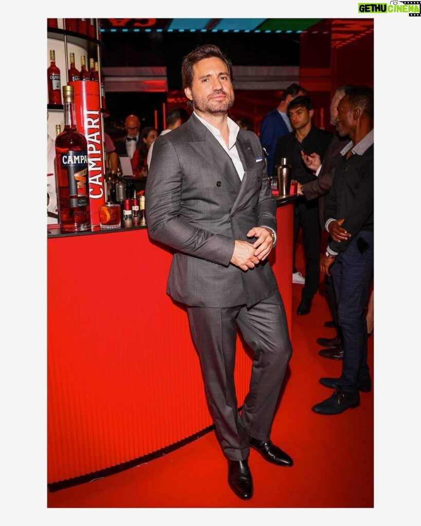 Edgar Ramírez Instagram - Toasting @campariofficial Official Partnership with the 75th Festival de Cannes. Thank you #campari for the perfect evening and for bringing great stories of cinema to life 💥 Dressed by: @gucci • Styled by: @jasonbolden • Groomed by @fabbhairdresser. #Campari #CampariCinema #Cannes2022 #RedPassion #drinkresponsibly #ad