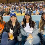 Emeraude Toubia Instagram - 💙⚾️🤍 My first @dodgers game! And maybe Erica’s first beer?! 😜 #DugoutSeats Dodgers Stadium