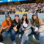 Emeraude Toubia Instagram - 💙⚾️🤍 My first @dodgers game! And maybe Erica’s first beer?! 😜 #DugoutSeats Dodgers Stadium