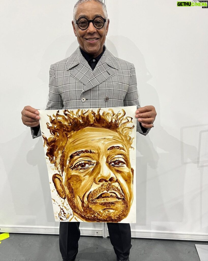 Giancarlo Esposito Instagram - Thank you @walescomiccon for such a wonderful weekend! Loved the #GusFring leg tattoo and head bust, and check out @nathanwyburnart’s natural element painting… MADE OUT OF COFFEE! #WalesComicCon = 10/10 👏🏽