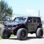 Griffin Johnson Instagram - I don’t post my appreciation as much as a should but when making this video today i took some time to reflect on my blessings. A few years ago I working in factories for $12 an hour with my dad. the first jeep pic is my first car that had a motor from the junk yard, no heat or AC, and rusted out floorboards where the rain and snow would get my feet wet (thank you splash for the upgrade). I am the first person in my family to graduate from college (pic is from high school bc I couldn’t make it to my college grad) when I thought that nursing was my destiny. I was just a kid from a small town and thanks to all of you I am able to touch lives all around the world. This is a small reflection of my past but I just wanted to take some time to say thank you for allowing me to live a better life and inspire others to do so. Paris, Illinois