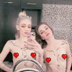 Grimes Instagram - Whose excited for @cyberpunkgame !!!! Dec 10!!! Im playing a cyborg popstar so I hope y’all make it to that part of the game hahaha Body art by grimes on my model @liv_boeree Swipe for galactic lady of shallot 🐉🎨🪐📷