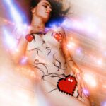 Grimes Instagram - Whose excited for @cyberpunkgame !!!! Dec 10!!! Im playing a cyborg popstar so I hope y’all make it to that part of the game hahaha Body art by grimes on my model @liv_boeree Swipe for galactic lady of shallot 🐉🎨🪐📷