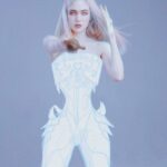 Grimes Instagram - un-used press photo where I tried to make a cyborg body in manga studio haha. Omg I finally get to drop my damn album in less than a month! Feeling good today but My clothes don’t fit 👿 dogs are incredible 🤍🐁🌙