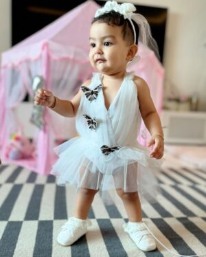Gurmeet Choudhary Instagram - Our little miracle is one today 🥹🫠❤️❤️❤️
Happy Birthday my @divishaadiva you complete us 🧿
.
My Outfit : @belavous 
Divisha’s Outfit : @shilpsaxena 
.
.
.
.
#DivishaTurnsOne #HappyBirthday