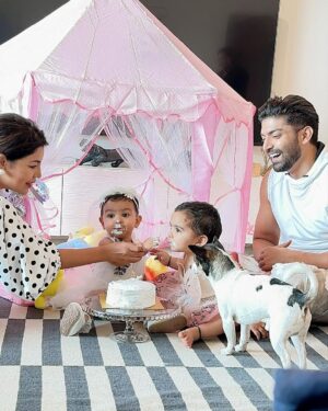 Gurmeet Choudhary Instagram - Our little miracle is one today 🥹🫠❤️❤️❤️
Happy Birthday my @divishaadiva you complete us 🧿
.
My Outfit : @belavous 
Divisha’s Outfit : @shilpsaxena 
.
.
.
.
#DivishaTurnsOne #HappyBirthday