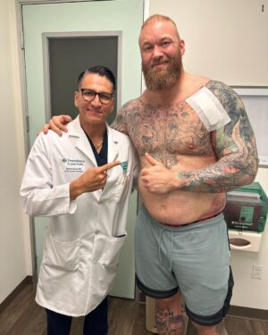 Hafþór Júlíus Björnsson Instagram - WARNING GRAPHIC SURGERY FOOTAGE. Live on my YouTube channel. Wednesday I’m 4 weeks post surgery. Sadly I got an infection 5 days ago resulting in an abscess and had to have a drainage tube inserted.  Finally had that removed today. Swipe to see the length of it! 🤯
