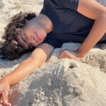 Iñaki Godoy Instagram - Sometimes, all we need is to lay down on the sand. And drink water, am I right @bookofjacob ???
