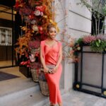 Jackie Aina Instagram – let me wear burnt orange ONE TIME 🤭

slip dress + cardigan: All Saints
shoes + handbag: Chanel One Aldwych