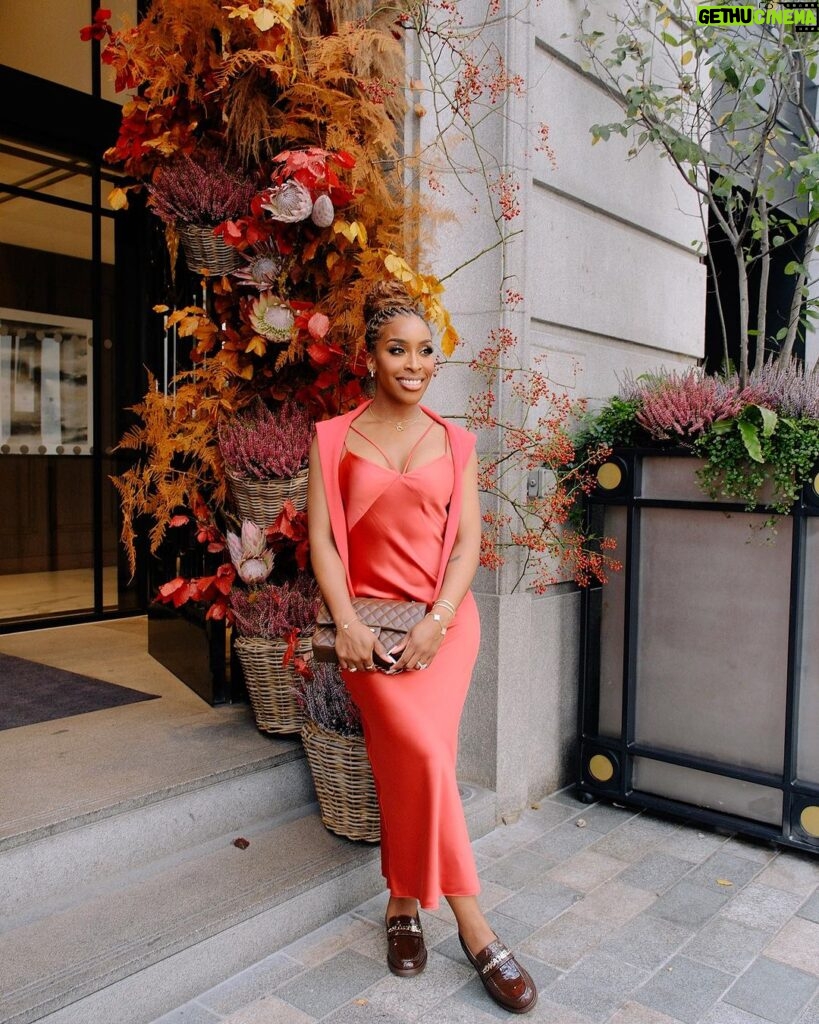 Jackie Aina Instagram - let me wear burnt orange ONE TIME 🤭 slip dress + cardigan: All Saints shoes + handbag: Chanel One Aldwych