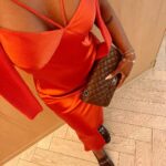 Jackie Aina Instagram – let me wear burnt orange ONE TIME 🤭

slip dress + cardigan: All Saints
shoes + handbag: Chanel One Aldwych