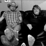 Jason Aldean Instagram - One of my favorite pics of all time. Getting a text and the stamp of approval today from this guy on our Christmas in Dixie cover is one of the coolest moments ever. @thealabamaband will always be the G.O.A.T’S to me. Hope we made y’all proud with it. Ryman Auditorium