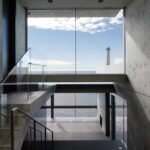 Jason Oppenheim Instagram - Coming Soon in Malibu - 24844 Malibu Rd. - $53,000,000 An architectural tour de force and only one of the few private homes in the United States designed by the renowned Pritzker Prize-winning Japanese architect, Tadao Ando. Best known for his minimalist structures and his assured use of reinforced concrete, Ando’s trademark design of “smooth-as-silk” concrete is wholly present in the structure and surface of the home. Constructed of approximately 1,200 tons of concrete, 200 tons of steel reinforcement, and 12 massive pylons driven more than 60 feet into the sand with AD100 architecture firm Marmol Radziner acting as executive architect and general contractor, the structure is an everlasting beacon of permanence on California’s coastline. Natural light is used creatively throughout the space, another signature of Ando, to manipulate a warm feeling throughout the building and harmonize with its natural surroundings. The home spans +/- 4,000 sq. ft. of interior space and approximately 1,500 sq. ft. of outdoor decks with ocean views from every room. Currently all interior finishes have been removed from the property, and work is needed to either restore or reimagine the interiors. Thoughtfully located on the prestigious and quiet Malibu Road, with easy access and close proximity to the finest restaurants, shopping, and entertainment in all of Malibu. An exceedingly rare architectural achievement that should be seen as a masterful work of art, rather than just a residence. Malibu Beach