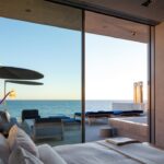 Jason Oppenheim Instagram - Coming Soon in Malibu - 24844 Malibu Rd. - $53,000,000 An architectural tour de force and only one of the few private homes in the United States designed by the renowned Pritzker Prize-winning Japanese architect, Tadao Ando. Best known for his minimalist structures and his assured use of reinforced concrete, Ando’s trademark design of “smooth-as-silk” concrete is wholly present in the structure and surface of the home. Constructed of approximately 1,200 tons of concrete, 200 tons of steel reinforcement, and 12 massive pylons driven more than 60 feet into the sand with AD100 architecture firm Marmol Radziner acting as executive architect and general contractor, the structure is an everlasting beacon of permanence on California’s coastline. Natural light is used creatively throughout the space, another signature of Ando, to manipulate a warm feeling throughout the building and harmonize with its natural surroundings. The home spans +/- 4,000 sq. ft. of interior space and approximately 1,500 sq. ft. of outdoor decks with ocean views from every room. Currently all interior finishes have been removed from the property, and work is needed to either restore or reimagine the interiors. Thoughtfully located on the prestigious and quiet Malibu Road, with easy access and close proximity to the finest restaurants, shopping, and entertainment in all of Malibu. An exceedingly rare architectural achievement that should be seen as a masterful work of art, rather than just a residence. Malibu Beach