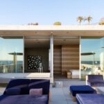 Jason Oppenheim Instagram - Coming Soon in Malibu - 24844 Malibu Rd. - $53,000,000 An architectural tour de force and only one of the few private homes in the United States designed by the renowned Pritzker Prize-winning Japanese architect, Tadao Ando. Best known for his minimalist structures and his assured use of reinforced concrete, Ando’s trademark design of “smooth-as-silk” concrete is wholly present in the structure and surface of the home. Constructed of approximately 1,200 tons of concrete, 200 tons of steel reinforcement, and 12 massive pylons driven more than 60 feet into the sand with AD100 architecture firm Marmol Radziner acting as executive architect and general contractor, the structure is an everlasting beacon of permanence on California’s coastline. Natural light is used creatively throughout the space, another signature of Ando, to manipulate a warm feeling throughout the building and harmonize with its natural surroundings. The home spans +/- 4,000 sq. ft. of interior space and approximately 1,500 sq. ft. of outdoor decks with ocean views from every room. Currently all interior finishes have been removed from the property, and work is needed to either restore or reimagine the interiors. Thoughtfully located on the prestigious and quiet Malibu Road, with easy access and close proximity to the finest restaurants, shopping, and entertainment in all of Malibu. An exceedingly rare architectural achievement that should be seen as a masterful work of art, rather than just a residence. Malibu Beach