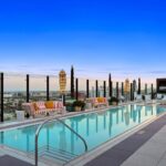 Jason Oppenheim Instagram – Just Listed – The Pendry Residences #307 – $4,195,000

2 Beds / 3 Baths / 2,393 Sq. Ft.

Immerse yourself in luxury at the Pendry Residences, a 24-hour full-service amenity building, located on the iconic Sunset Strip in West Hollywood. Residence 307 offers unparalleled privacy with breathtaking south-facing Downtown LA views. Serene and sophisticated, the home exudes an opulent ambiance with wide plank white oak flooring and floor-to-ceiling glass walls that bathe the space in natural light. The chef’s kitchen, designed by Martin Brudnizki, is the perfect blend of functionality and elegance equipped with top-of-the-line Subzero and Wolf appliances, custom white oak stained cabinetry, Waterworks fixtures, and an oversized Calacata Borghini marble island. The generously sized primary suite is a haven of luxury, featuring a customized Poliform walk-in closet and a marble spa-like bathroom with custom double vanities and high-end polished chrome fixtures. Completing the residence are a guest bedroom with en-suite bath, powder room, laundry room, in-wall speakers, direct access via a private elevator, and two side-by-side parking spaces equipped with a triple charger. The Pendry Residences offers a range of residential amenities, including 24-hour concierge and security services, valet parking, a state-of-the-art fitness center, a resident lounge, a tranquil garden deck, a rooftop pool, and services of the Pendry Hotel. West Hollywood, California