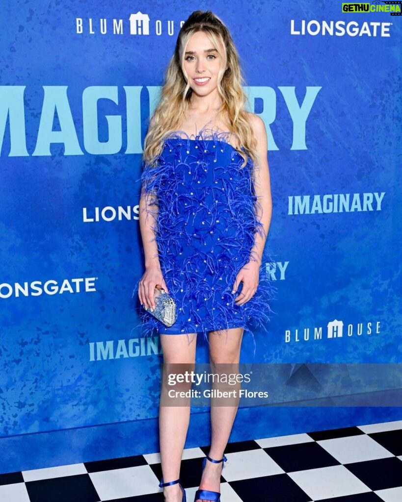 Jenna Davis Instagram - All the feathers 💙 I had such a blast with my @meetm3gan & @blumhouse family celebrating their new film @imaginaryfilm ✨ 💇‍♀️: @hairbybradleyleake ✨: @styledbylmc 👗: @shopakira 👛: @ahikozaofficial 👠: @charleskeithofficial