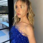 Jenna Davis Instagram – All the feathers 💙 I had such a blast with my @meetm3gan & @blumhouse family celebrating their new film @imaginaryfilm ✨

💇‍♀️: @hairbybradleyleake 
✨: @styledbylmc 
👗: @shopakira 
👛: @ahikozaofficial 
👠: @charleskeithofficial