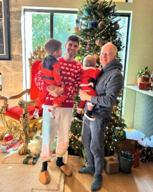 Jesse Tyler Ferguson Instagram - Merry Christmas & happy holidays from the Mikita - Ferguson household. Thanks to Santa for making a visit, to @sarahcarey1 for making everything delicious, to @toddhawk for bringing the spirit & @pernodricardusa for keeping the bar stocked! Sending y’all so much love. ❤️❤️🎁🥰🎅🏻