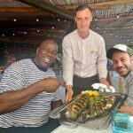 Jimmy Kimmel Instagram – We only eat the heads! #CalaDiVolpe @MagicJohnson Sardinia, Italy