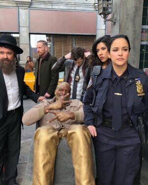 Joe Lo Truglio Instagram - 🚨BTS🚨”Cinco De Mayo” Heist, Season 6.  This was a fun day and Terry was a living trophy. 🏆Not easy makeup to be in for ten hours, but golden attitude.  I remember thinking how wonderfully outrageous this show is, as us weirdos pushed a shopping cart as fast as we could down the street Seinfeld used to shoot on. 🤯
#b99mems