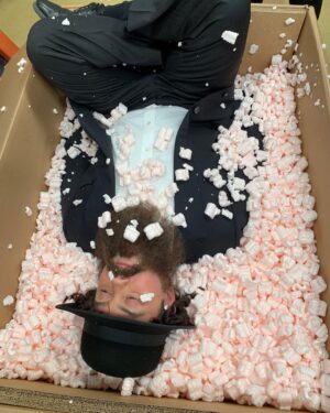 Joe Lo Truglio Instagram - 🚨BTS🚨”Cinco De Mayo” Heist, Season 6.  This was a fun day and Terry was a living trophy. 🏆Not easy makeup to be in for ten hours, but golden attitude.  I remember thinking how wonderfully outrageous this show is, as us weirdos pushed a shopping cart as fast as we could down the street Seinfeld used to shoot on. 🤯
#b99mems