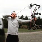 Joel Courtney Instagram - It may be too early to call archery a passion, but it sure feels like it is. Next step is repetition, right @cameronrhanes? #archery #archerylife #archerypractice #compoundbow #hoyt Springfield, Oregon