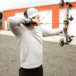 Joel Courtney Instagram - It may be too early to call archery a passion, but it sure feels like it is. Next step is repetition, right @cameronrhanes? #archery #archerylife #archerypractice #compoundbow #hoyt Springfield, Oregon