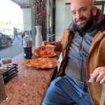 Joey Diaz Instagram – Lee enjoying a tremendous slice of pizza at Carlo’s….