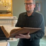 John Green Instagram - Scenes from London, including 1. The absolute terror of holding the original manuscript of Isaac Newton’s Principia, 2. The wonder of Yayoi Kusama’s infinity rooms, and 3. Scenes from @afc_wimbledon’s biggest win at Plough Lane, including my embrace of our heroic head of football operations Craig Cope.