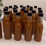 John Green Instagram - It’s time to make the secret family hot sauce, which fermented for four months.
