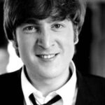 John Lennon Instagram - What's your favourite song from the early Beatles ‘black and white’ era? Photos: John Lennon making faces to Max Scheler in a break from filming 'A Hard Days Night' on a train between London Paddington and Minehead, UK, March 1964